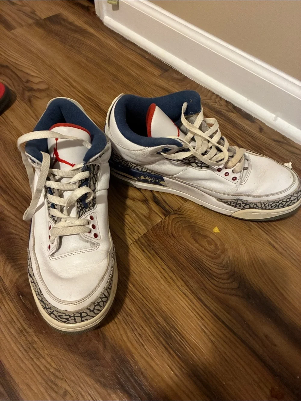 Jordan Men's White Sneakers with Blue & Red Accents